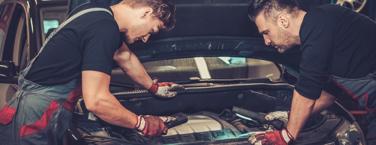 Mechanics doing a service on a vehicle - Car Servicing in Kirkcudbright