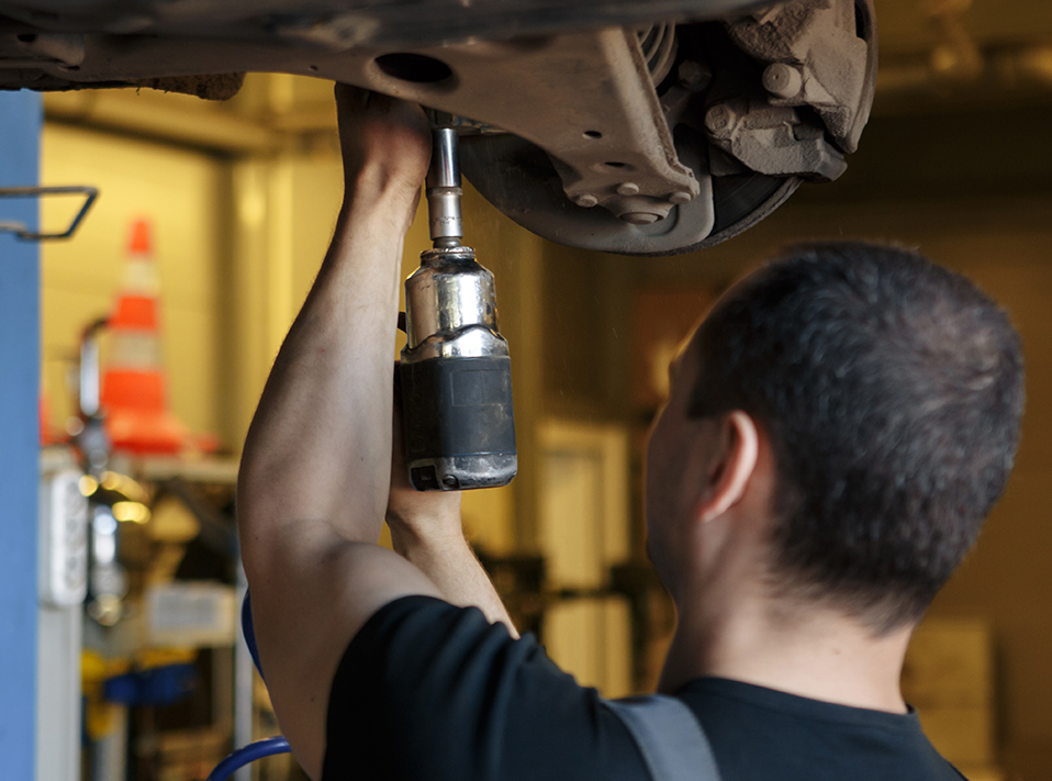 Mechanic repairing a vehicle - Suspension Kirkcudbright